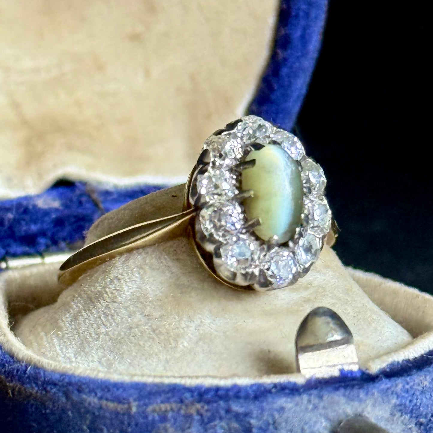 Antique Cat’s Eye Chrysoberyl & Diamond Halo Ring in 18 Carat Gold