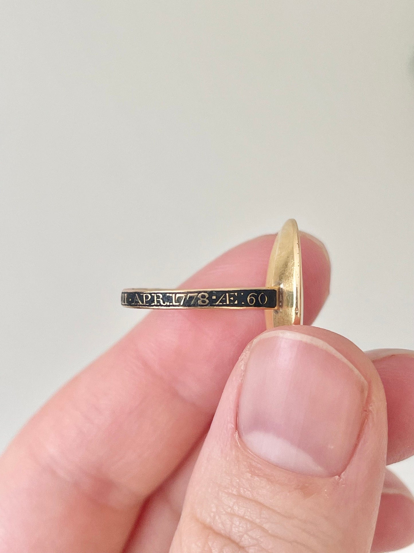 Georgian Sepia Mourning Ring in 18 Carat Gold; Circa 1778