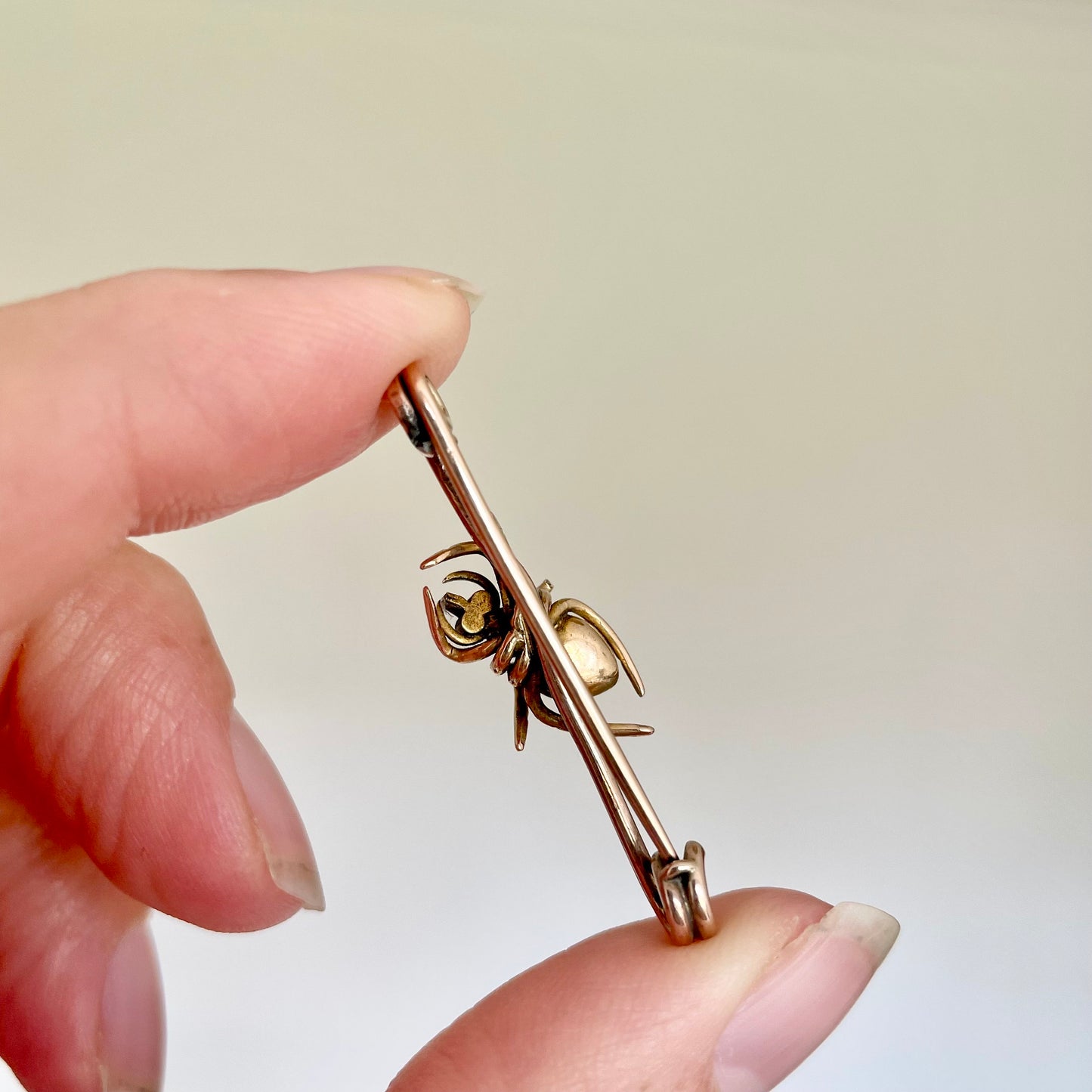 Victorian Spider Ruby and Pearl Brooch in 9 Carat Rose Gold; Circa 1890