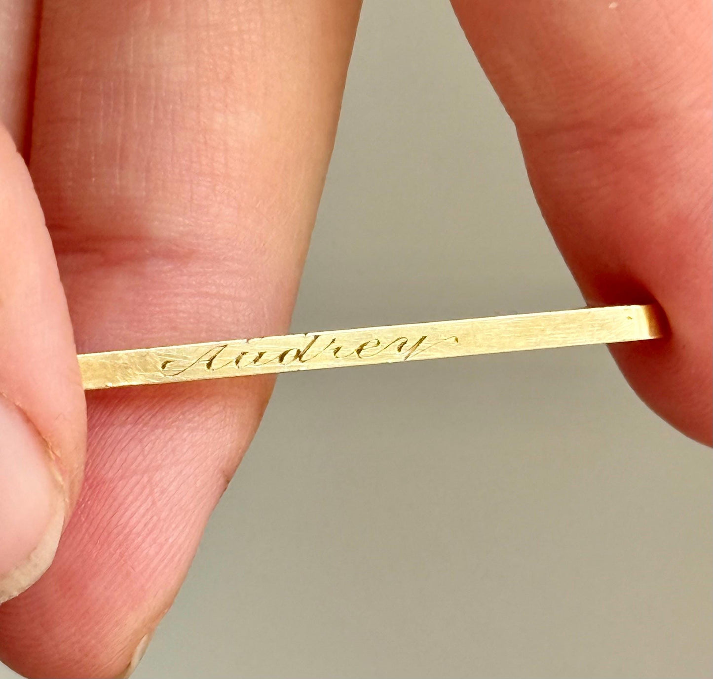Antique 'Audrey' Bar Brooch in 15 Carat Gold; Circa 1890s