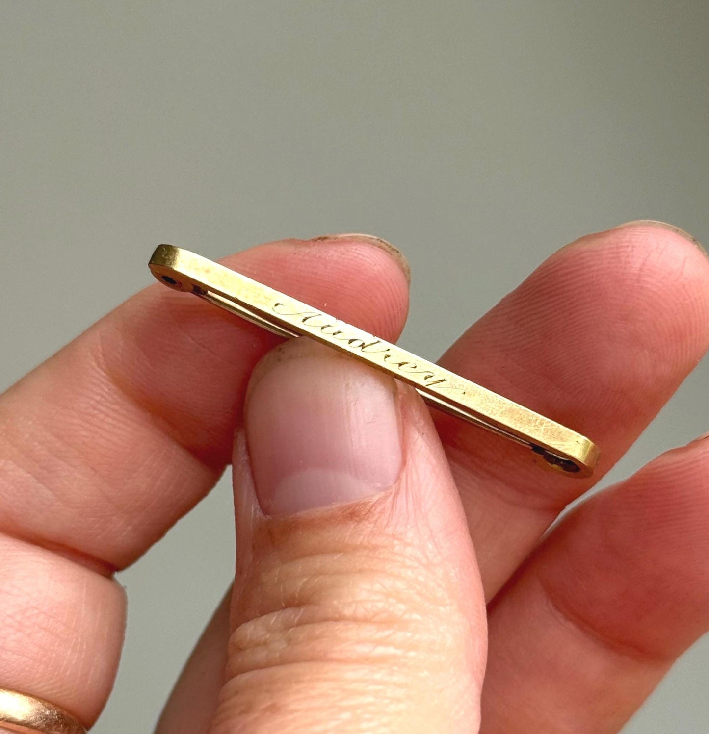 Antique 'Audrey' Bar Brooch in 15 Carat Gold; Circa 1890s