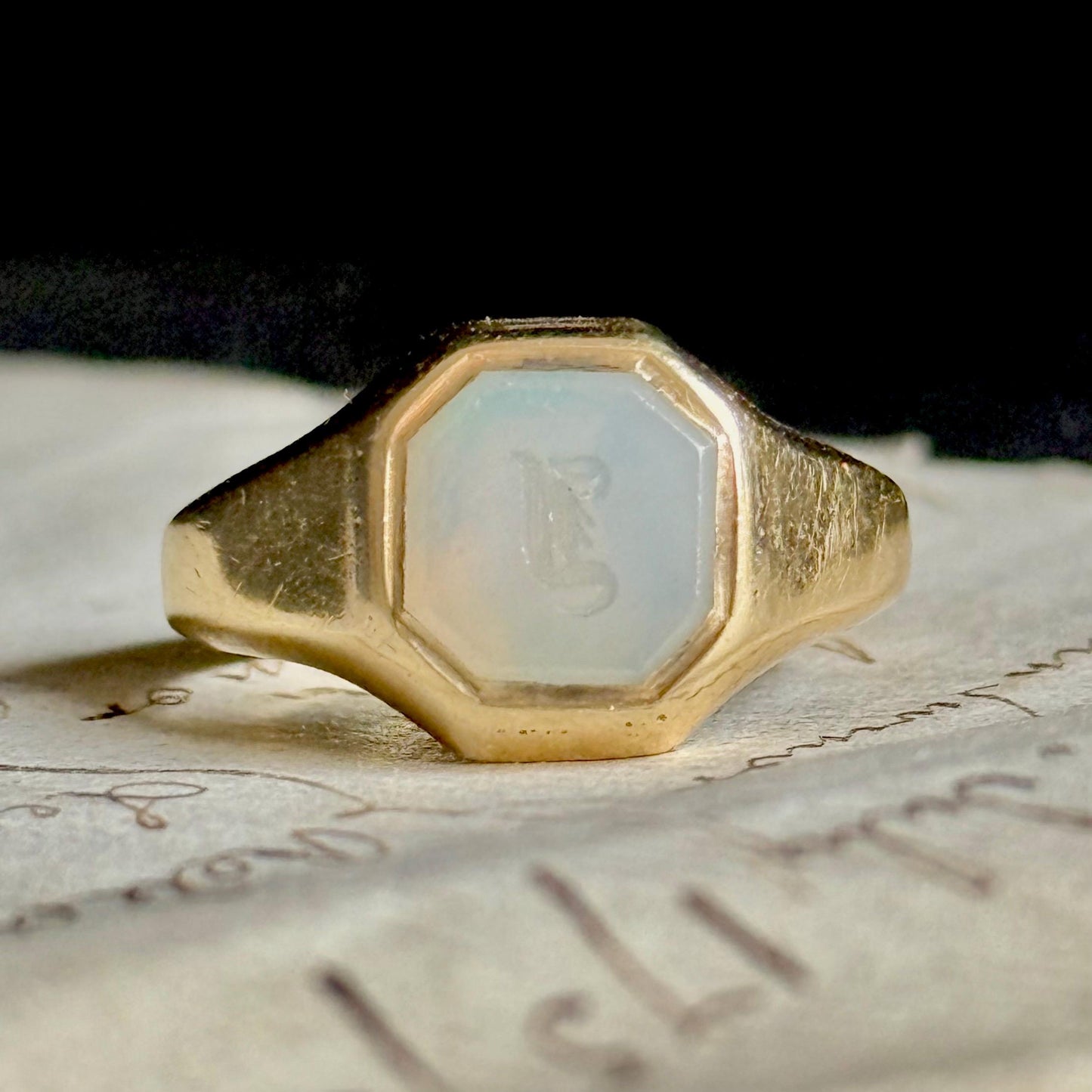 Victorian Chalcedony Monogram 'J or L Intaglio Signet Ring in 9 Carat Gold; Circa 1880
