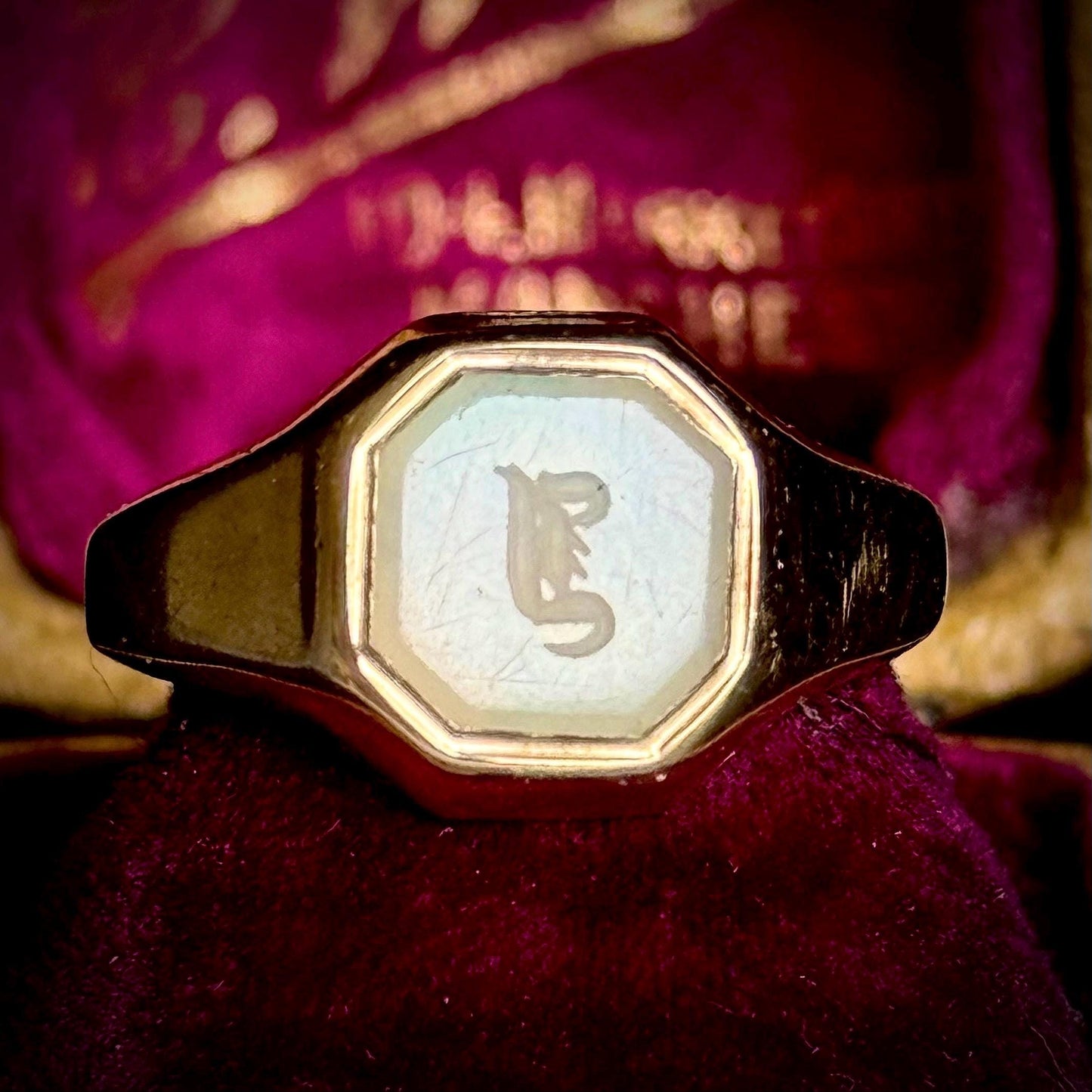 Victorian Chalcedony Monogram 'J or L Intaglio Signet Ring in 9 Carat Gold; Circa 1880