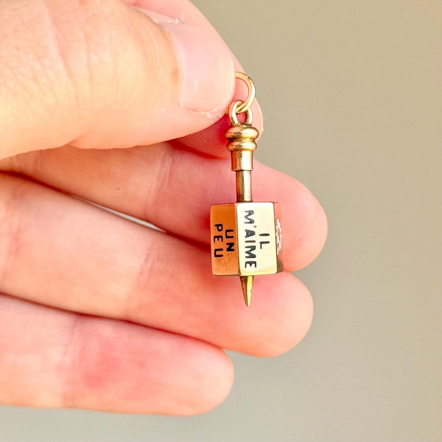 Victorian French 'Il Maime' Spinning Top Enamel Pendant; Circa 1880