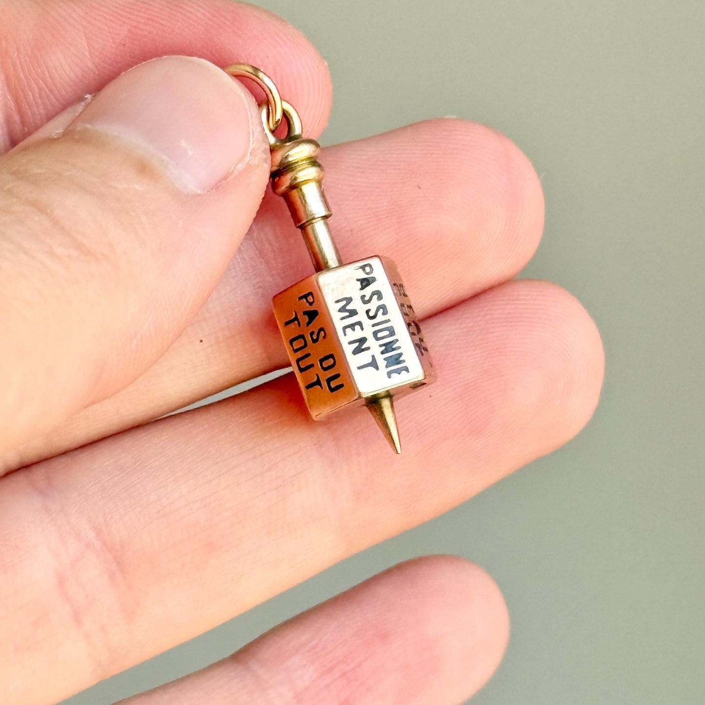 Victorian French 'Il Maime' Spinning Top Enamel Pendant; Circa 1880